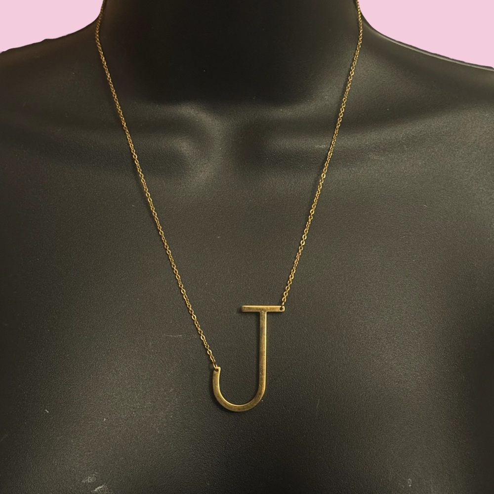 Gold tone initial letter J necklace